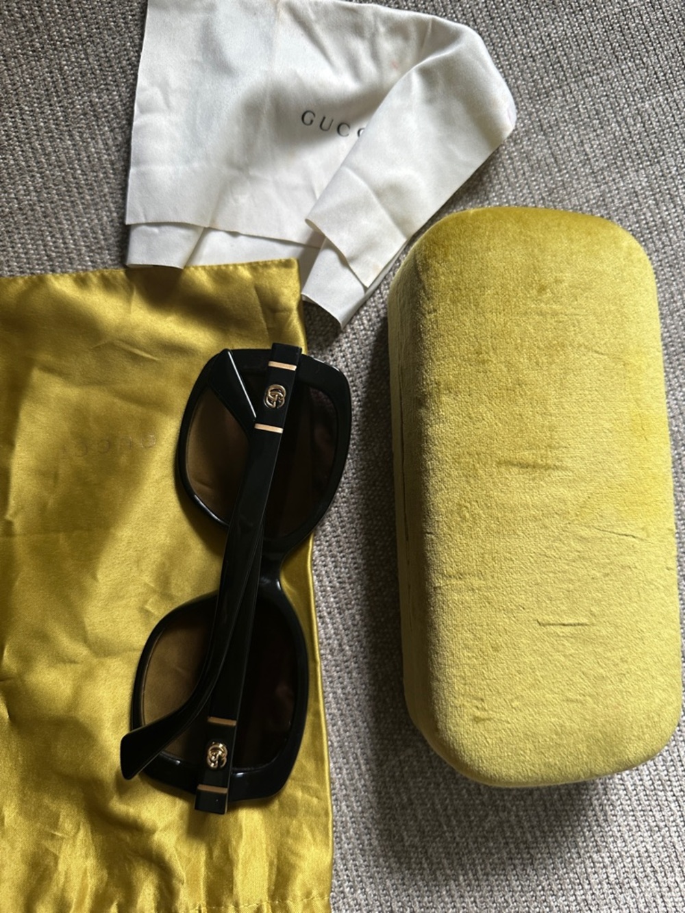 Gucci Black Sunglasses with Gold Logo Accents
